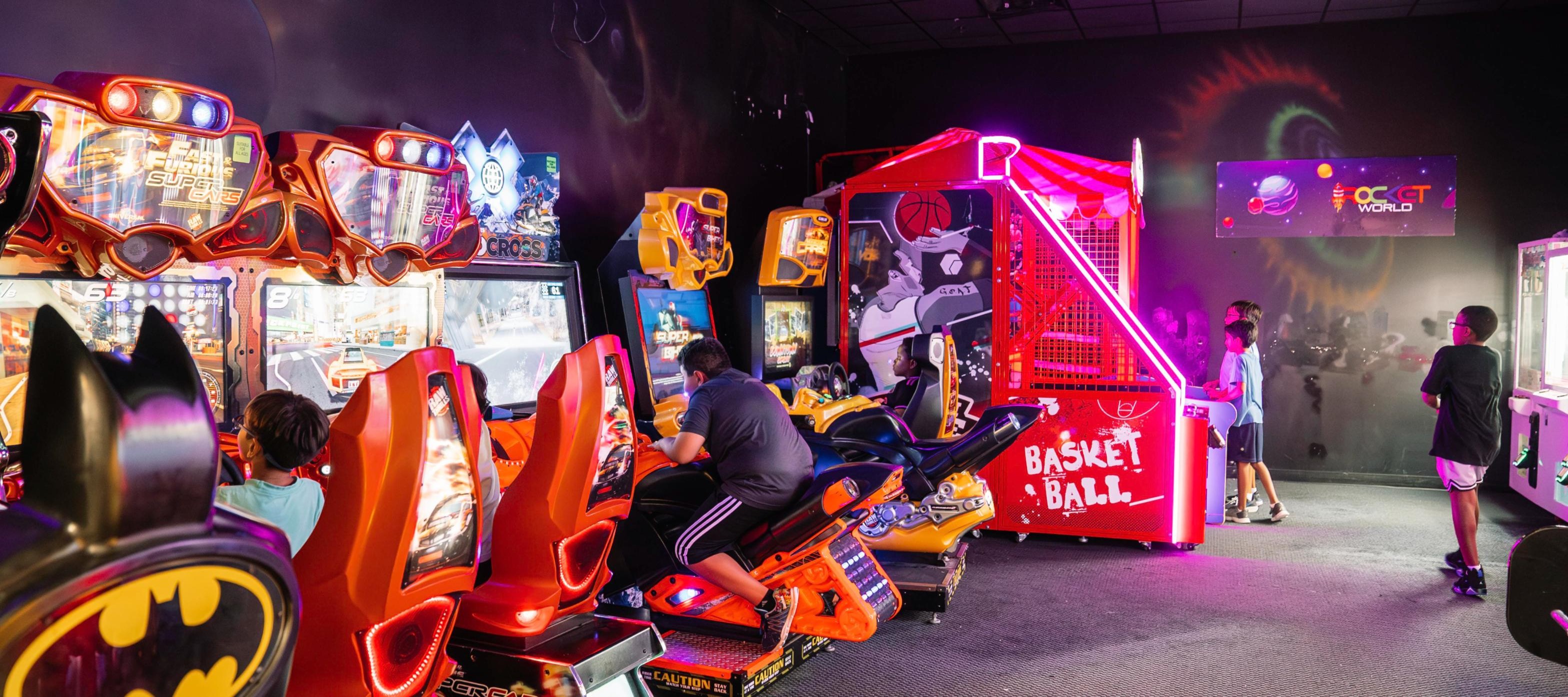 Kids playing arcade games at Rocket World Pembroke Pines